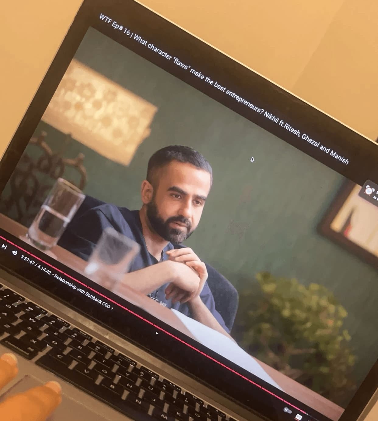 A podcast episode playing on a tablet